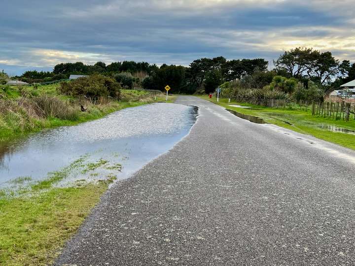 Water almost across the whole width of Strathnaver Drive.