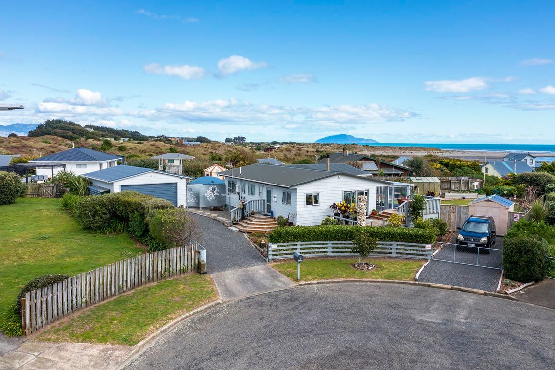 8 Norna Grove, drone shot with Kāpiti Island in the background. 