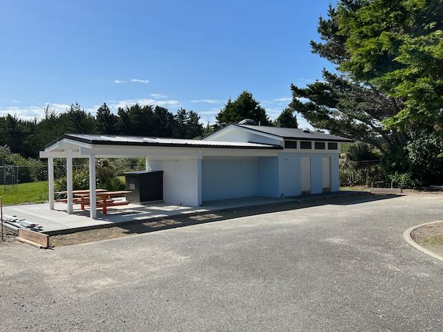 Toilet block exterior showing BBQ end. 