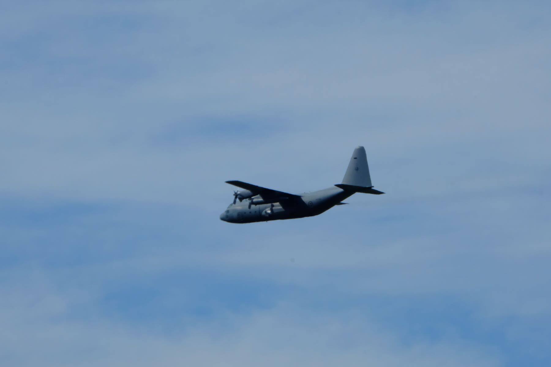 C 130H NZ Hercules aircraft flying by. 